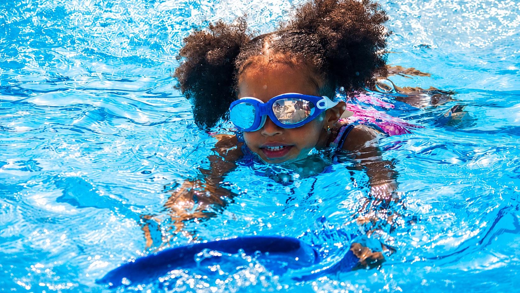 A pupil during a swimming session at Milestones Academy